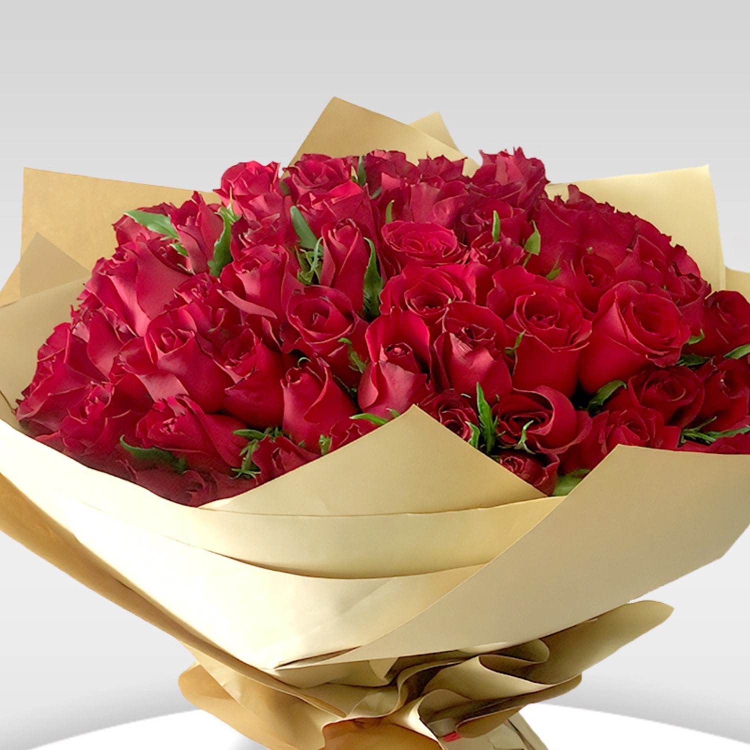 Bouquet Of 50 Red Roses In A Brown Wrapping With Red Ribbon